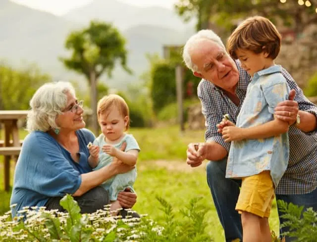 Grandparents playing with grandchildren